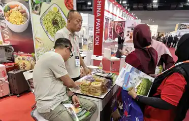 บล็อกบะหมี่กึ่งสำเร็จรูป Dongyang Food ที่นิทรรศการฮาลาลมาเลเซีย บล็อกบะหมี่กึ่งสำเร็จรูป Dongyang Food ที่นิทรรศการฮาลาลมาเลเซีย